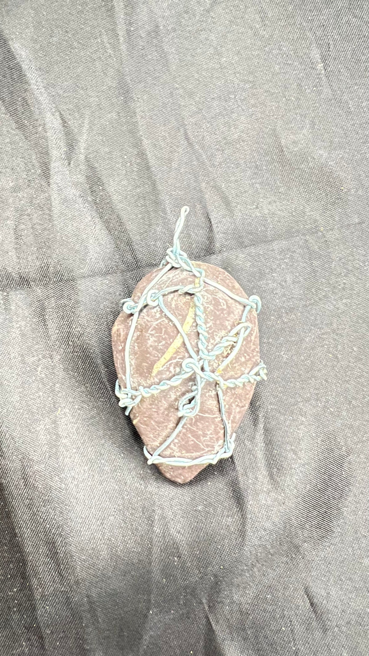 The Leaf-Marked One — Mauve Stone Pendant in a Hand-Woven Wire Net, Blessed — One of One