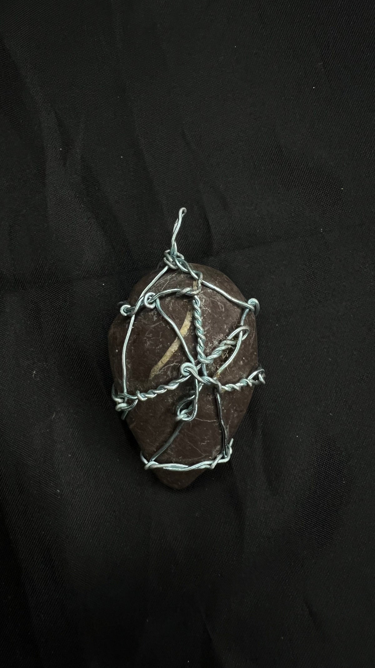 The Leaf-Marked One — Mauve Stone Pendant in a Hand-Woven Wire Net, Blessed — One of One